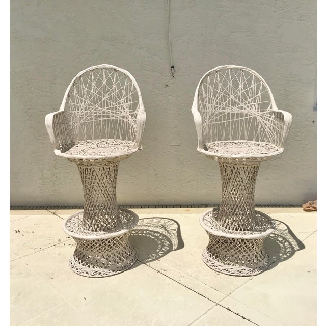 Vintage Mid Century Russell Woodard patio Bar Stools that swivel. There is no markings on these chairs , but the owner...