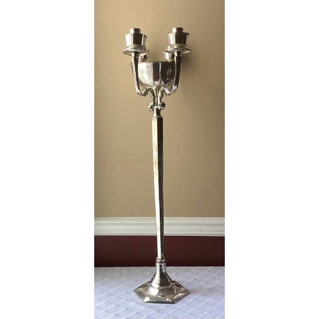 This magnificent vintage silver-plated church altar piece combines a central holy water font with a four-light candelabra,...