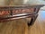 Solid elm, this table has classic Ming and Qing dynasty features; the beaded edge along the apron, the carved scrolling...