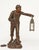 Miner Large Art Nouveau metal figure, circa 1900. Miner with axe and lantern on a naturalistically designed background....