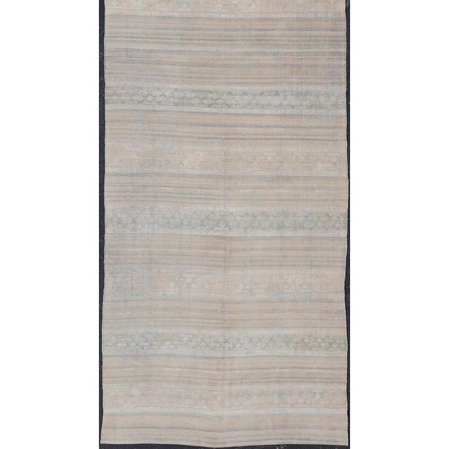 Measures: 5'6 x 19'9 Vintage Turkish Gallery Kilim with Soft Sand, Pale Sage, and Powder Blue. Keivan Woven Arts /...