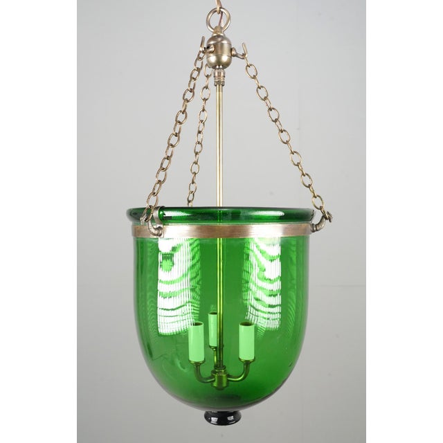 Antique original hand blown green crystal bell jar pendant light with brass hardware. This light requires three E-12...