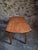 Antique French drop-leaf dining table dating from around 1900. The table has a cherrywood top and beech legs, with a...