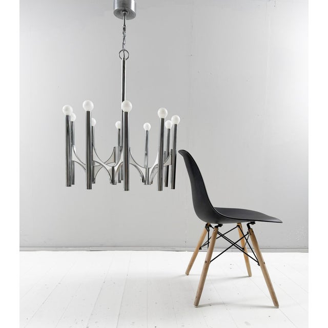 Mid-century chandelier by Gaetano Sciolari, Italy, 1960s, solid construction made of brass, 10 light sources, Dimensions...