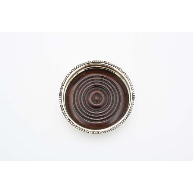 Silver Bottle Base with Rosewood Bottom, in Good conditions. Designed 1920 to 1949