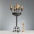 Late 19th-century wrought iron torchère from Italy, featuring an elaborate and detailed design. It has five lights, with...
