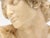 An early 20th century fine wax bust in a classical Roman style. This classical sculpture wax bust features a beautiful...
