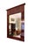 Biedermeier wall mirror Berlin around 1820. Mahogany veneer on oak body with carved stylized foliage. Mirror glass...
