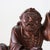 A 19th Century Chinese carved wood folklore figure, presented on a natural root wood base. This finely rendered sculpture,...