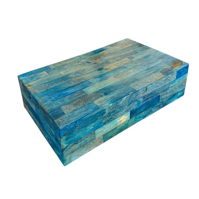 A sophisticated decorative hinged box attributed to Maitland Smith, handcrafted in the 1970s and clad in an intricate...