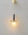 A distinctive german vintage pendant lamp from the 1970s. the lamp features a cylindrical shade made of solid, clear...