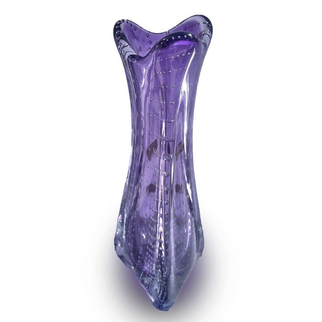 The Lavender Crystal Vase showcases an Art Deco style with its delicate lavender hue and transparent accents, offering a...