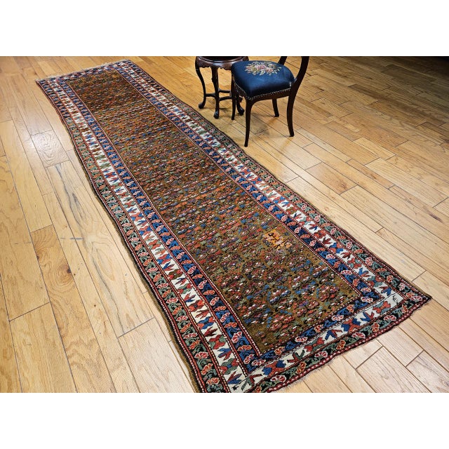 "This authentic antique Persian Kurdish camel hair runner, dating to the early 1900s. . Handwoven from lustrous camel hair...