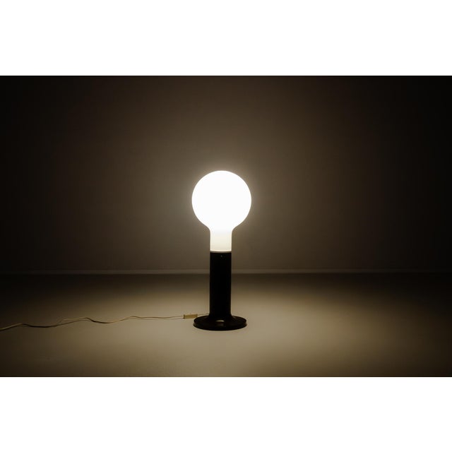 Space Age Floor Lamp in Glass & Metal by Temde Leuchten. Produced in Switzerland, 1960s. This elegant floor lamp by Temde...