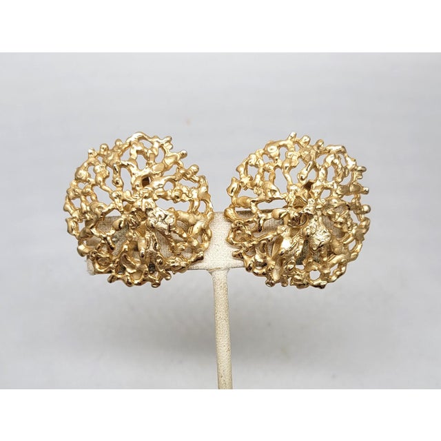 1970s Modernist goldtone abstract almost coral like round clip earrings. Marked "NAPIER PAT. PEND." Measure: 1 1/2 inches...
