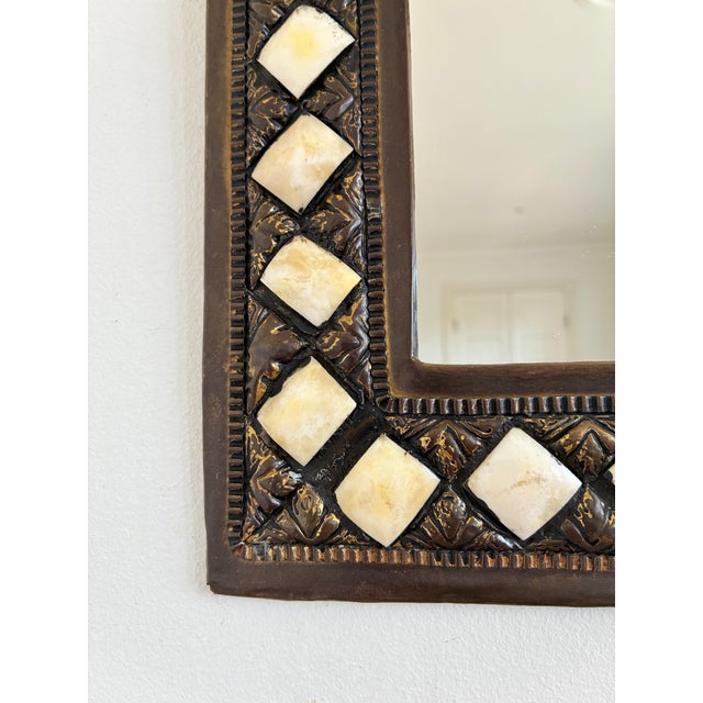 Vintage Moroccan Moorish Wall Mirror, Arched Inlay & Brass-Tone Metalwork, Late 20th Century The mirror has an arched...