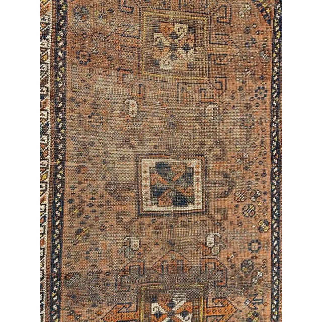 Late 19th century small distressed Shiraz rug with pretty tribal designs and nice natural colours with orange, brown,...