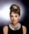 Audrey Hepburn "Breakfast at Tiffany's" This elegant selectively colored promotional portrait features Audrey Hepburn in...