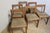 Set of 6 dining chairs made of beech wood. They have a solid structure. 80s design.