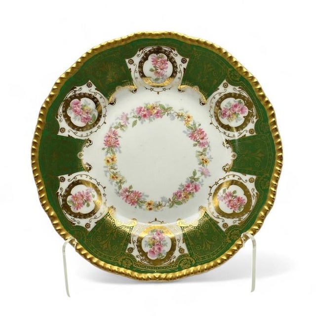 An elaborately hand painted Victorian Limoges plate, made in France before 1895 (prior to the partnership of Remi...