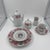 Bring timeless elegance to the table with this vintage 67-piece Remington Fine China dinnerware set in the beloved Red Sea...