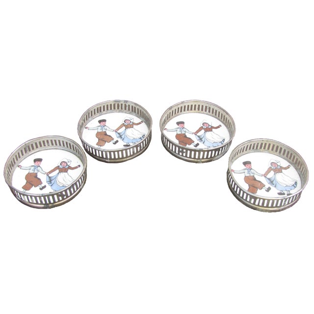 Charming set of antique porcelain beverage coasters featuring a dancing Dutch boy & girl in traditional dress. Porcelain...