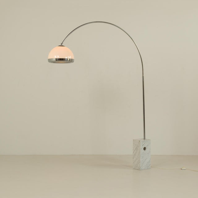 This italian mid-century arc lamp was produced at the turn of the 1960s and 1970s. Although its designer remains unknown,...