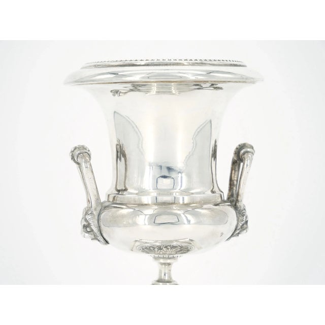 Discover the exquisite charm of our Old English Sheffield silver plated small decorative urn / vase with lion head side...