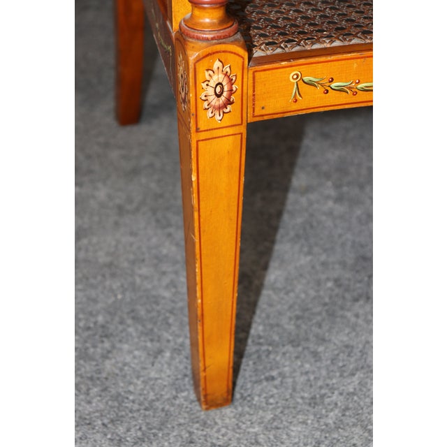 This exceptional pair of Gillows & Company Adams-style cane armchairs, crafted in England during the late 19th to early...