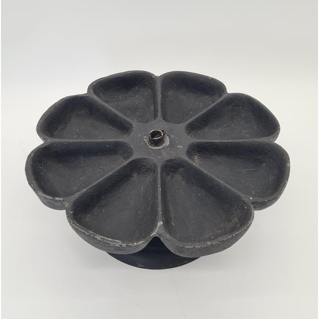 A rare and highly decorative antique cast-iron shoemaker’s organizer with eight compartments, originally designed for...
