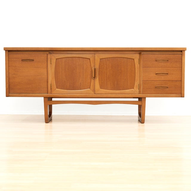 This elegant mid-century credenza by Jentique Furniture showcases the clean lines and refined craftsmanship that define...