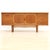 This elegant mid-century credenza by Jentique Furniture showcases the clean lines and refined craftsmanship that define...