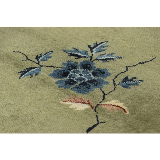 Made with hand-knotted wool, this 3x6 contemporary runner rug represents the Chinese Art Deco rug collection by Rug &...