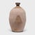This large ceramic jar from China's Shandong province has a bottle-neck shape meant for storing vinegar or wine made from...