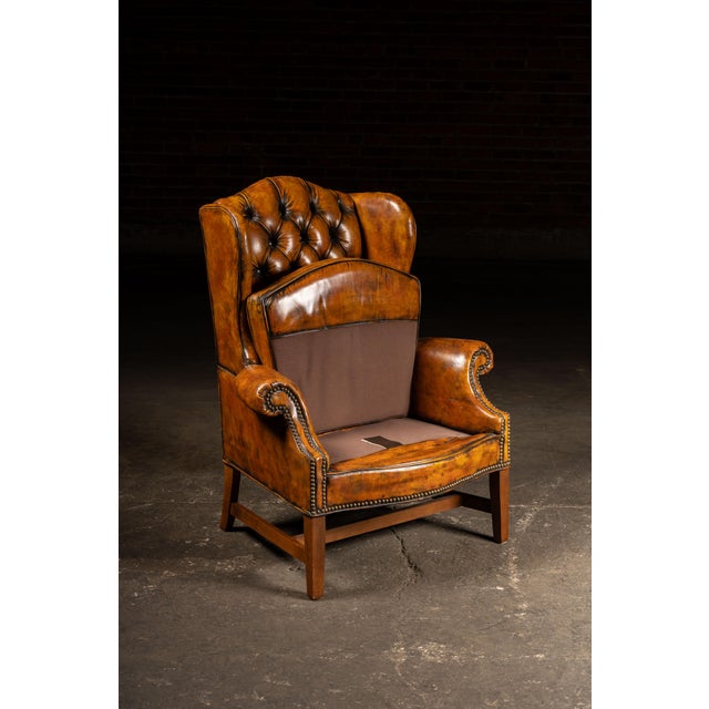 Mid 20th Century Tufted Leather Wingback Armchair in Amber For Sale In Chicago - Image 6 of 9