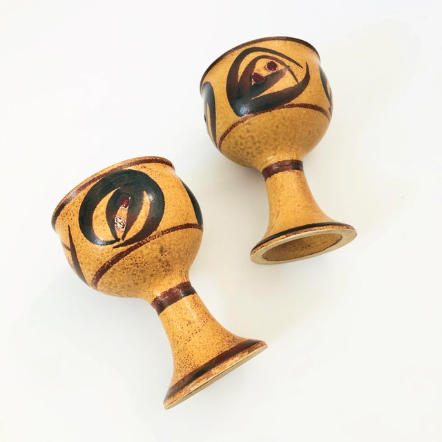 A set of 2 vintage studio pottery goblets. Beautiful hand painted design in natural colors.