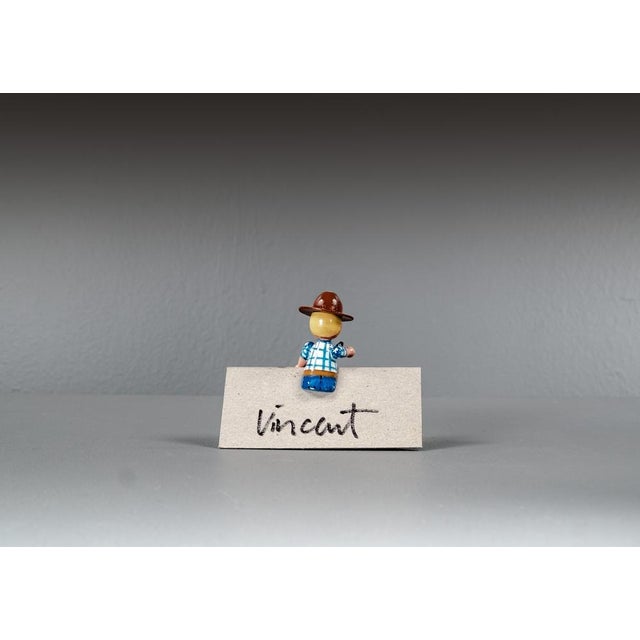 Cowboy and Indian place card holder, hand-painted in original packaging and unused. There are 3 different cowboys and...