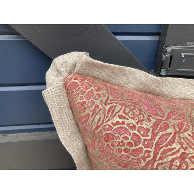 A pillow made from Fortuny’s iconic Fiori pattern printed fabric, backed and edged with Belgian linen, a down insert is...