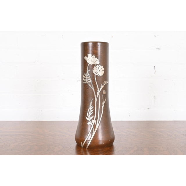 A beautiful Arts & Crafts period sterling silver on bronze large vase with floral design By Heintz Art Metal Shop USA,...