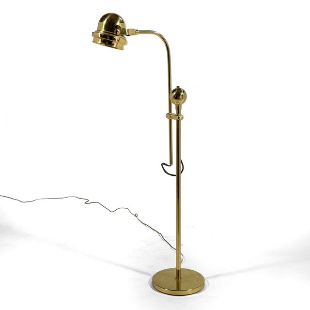 This terrific vintage brass pharmacy floor lamp is beautiful, well built, and versatile. Adjustable in height, with a head...