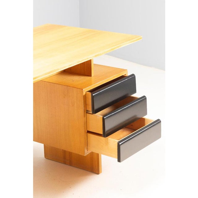 This writing desk was designed by architect Bohumil Lansman, a notable figure of post-war furniture design. The piece...