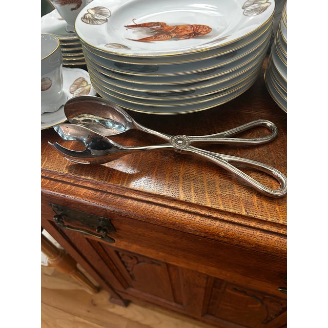 For salads, asparagus, and charcuterie, these silver plate tongs will make serving easy and elegant. Identified as the...