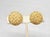 1960s round goldtone "woven" clip earrings. Marked "CINER" on the clip backs. Measure: 1 inch across. Condition: Very...