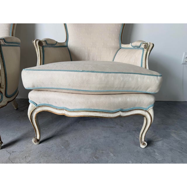 Pair of Vintage Hollywood Regency French Louis XV-Style Painted & Gilt Bergère Lounge Armchairs For Sale - Image 9 of 12
