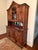 This is an exceptional antique French walnut buffet hutch, showcasing beautifully detailed carving, architectural...
