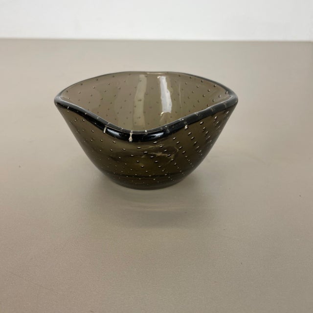 Article: Murano glass bowl, ashtray element Producer: Venini Glass, Murano Origin: Murano, Italy Decade: 1970s This...