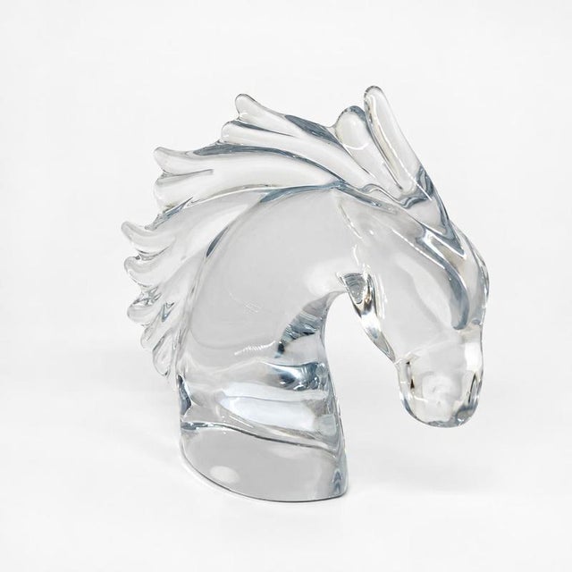 Daum France - "Horse's Head". A freestanding sculpture representing a horse's head, in solid molded and polished clear...