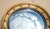 A beautiful antique 1920s Butler’s convex wall mirror, crafted with a circular gold gilt wood frame and a classic domed...