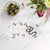 Thistle And Snake Cocktail Napkins intertwine thistle floral patterns with bold serpent motifs, creating a striking mix of...