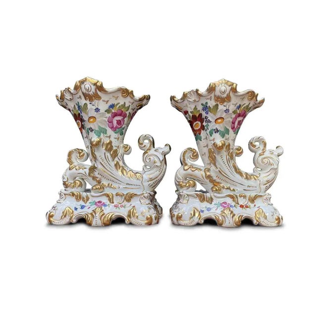 Pair of French Porcelain Cornucopia Vases, Late 19th Century. This elegant pair of late 19th-century tulip vases in the...